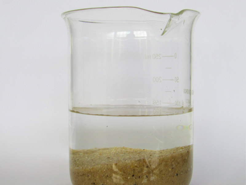 Water in a glass with contaminates