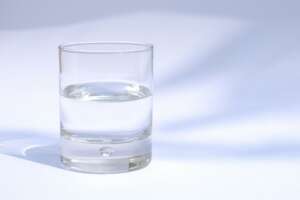 Half glass of clean water