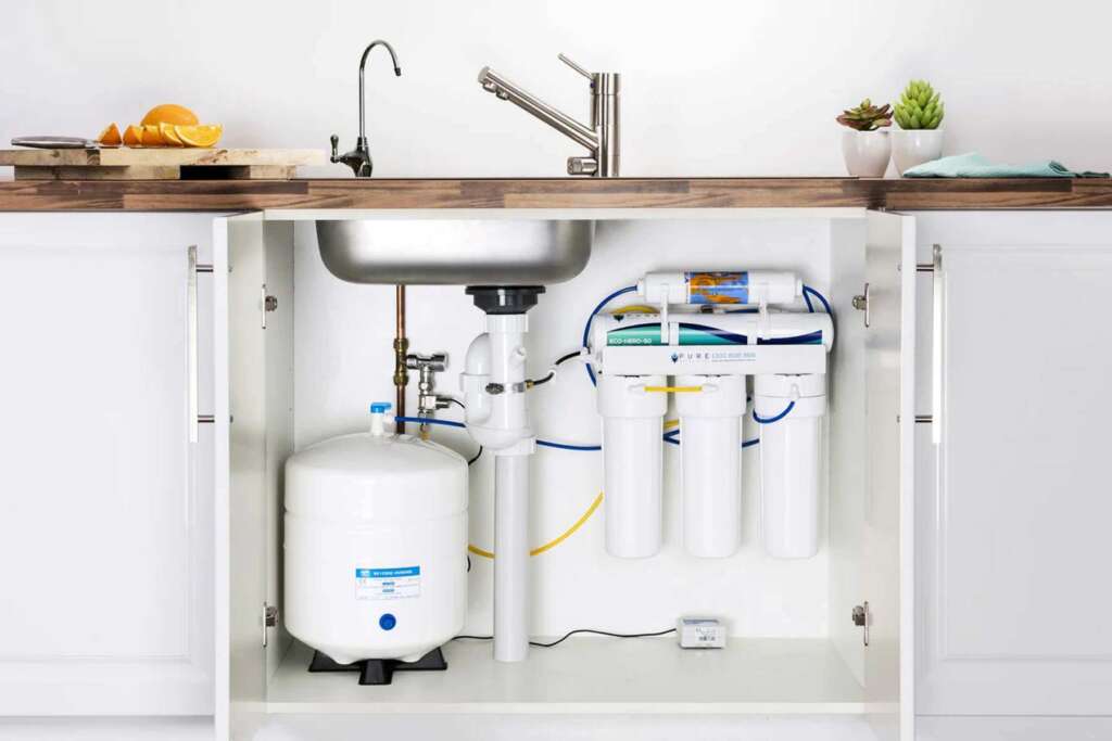 Reverse osmosis filter installed under the kitchen sink