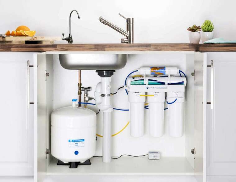 Reverse osmosis filter installed under the kitchen sink