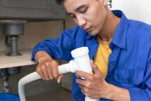 A man checking water filter issue