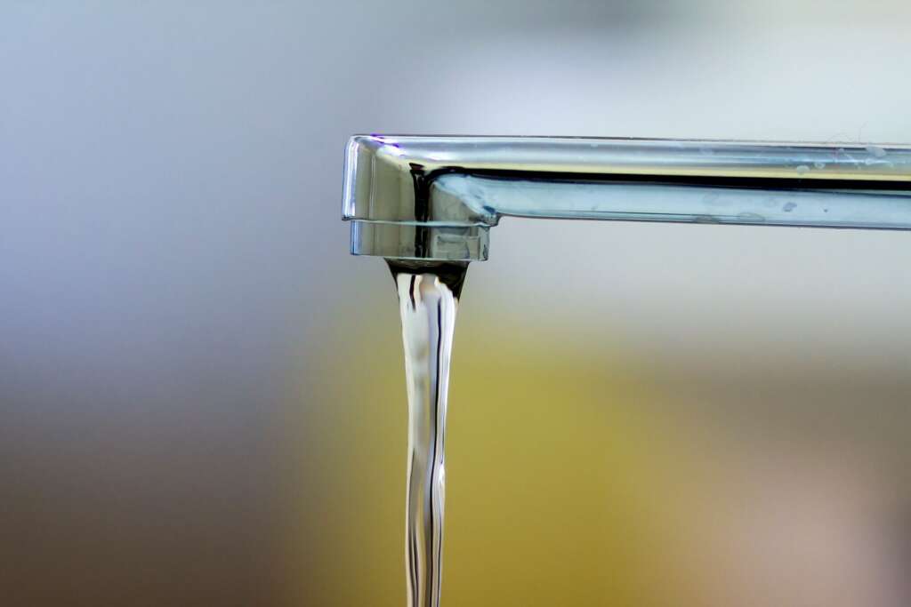 Running water from a faucet