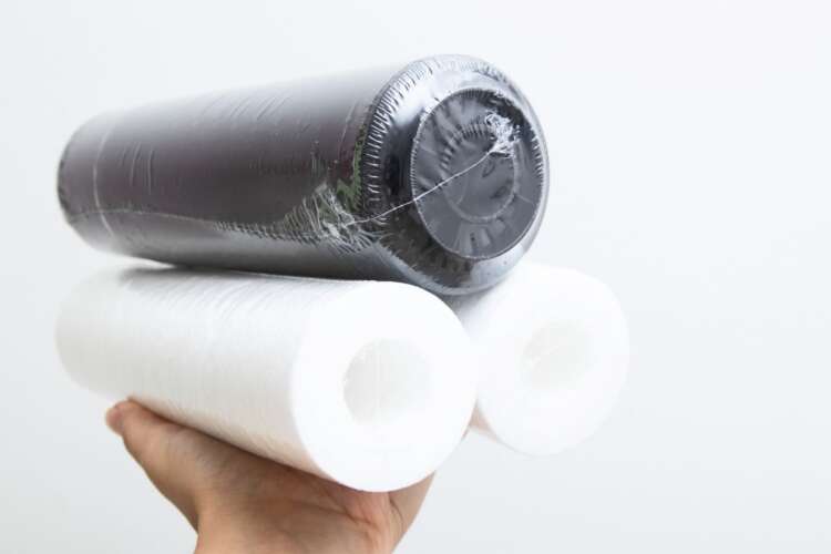 Holding sediment filter replacement cartridges for water filtration